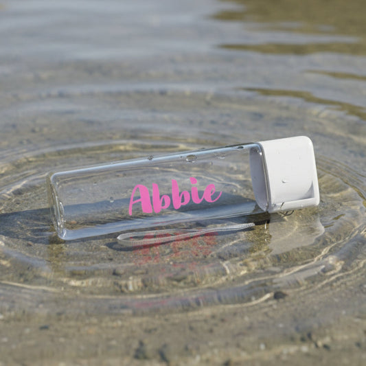 Clear water bottle with 'Abbie' branding, featuring product size, material quality, ease of carrying, and color options on a light background.