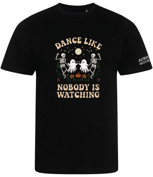 Dance like nobody is watching organic black t-shirt, featuring two dancing skeletons, next to two dancing ghosts celebrating drinking glasses of wine over a bed of pumpkins, ferns, florals, sunflowers and mushrooms. All under the moon and stars. This is a cute and spooky unisex  t-shirt made and designed by Aurora's Destion.